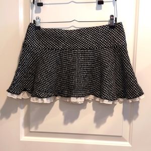 Tweed style mini skirt with white ruffles M